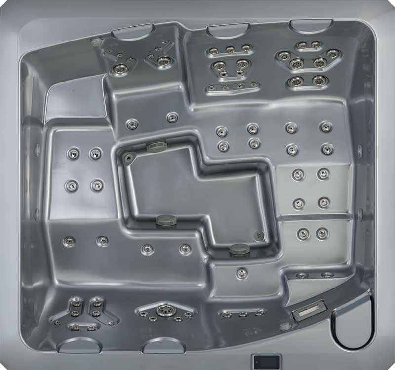 Draufsicht auf einen grauen USSPA-Whirlpool mit ergonomischen Sitzen und mehreren Düsenzonen